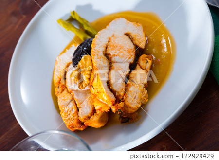 Spicy turkey breast in mango sauce Spicy turkey breast in mango sauce 122929429