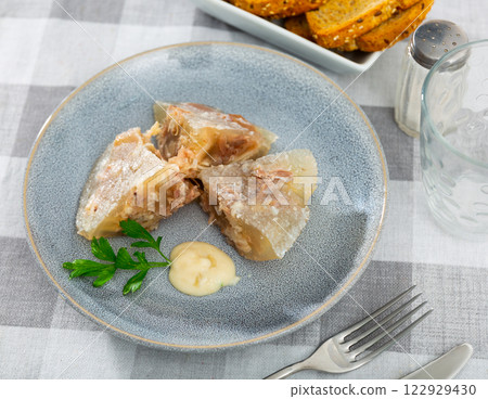 Traditional russian dish kholodets served on plate Traditional russian dish kholodets served on plate 122929430