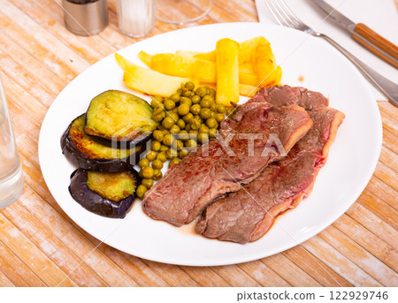 Roasted beef with potatoes 122929746