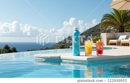 Refreshing Poolside Lounge with Floating Cushions and Drinks A luxurious poolside lounge area with floating cushions in the water, vibrant tropical drinks placed 122930933