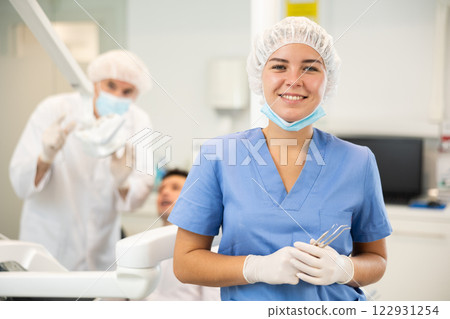 Young woman nurse in dental office 122931254