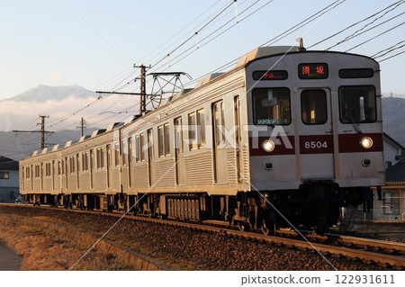 Nagano Electric Railway 8500 series T4 formation bathed in the sunset Nagano Electric Railway 8500 series T4 formation bathed in the sunset 122931611