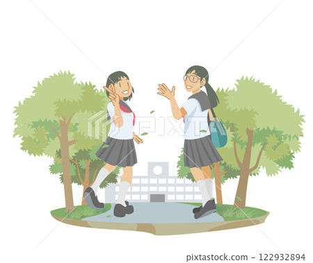 Female students walking to school along a green-lined street 122932894