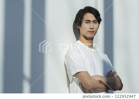 A man in his 20s looking at the camera Men's beauty Skin care image 122932947