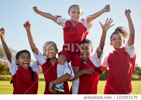 Soccer, team and girls celebrate winning, success and competitive game on field. Teamwork, happy players and female football champions group victorious together with fitness, exercise and training. 122933170