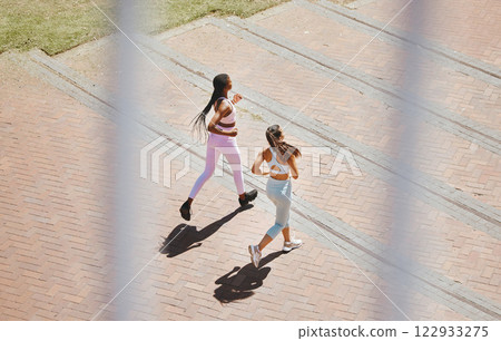 Running, fitness and women friends exercise on steps outdoor for healthy lifestyle, wellness motivation and accountability. Sports friends, couple or runner people doing workout training together 122933275