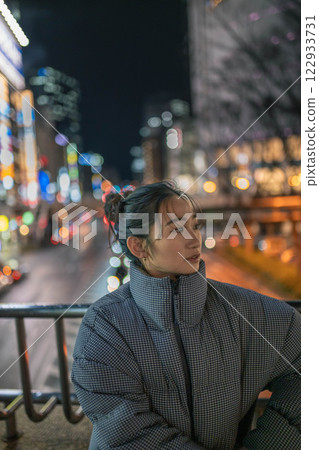 City night view and young woman portrait City night view and young woman portrait 122933731