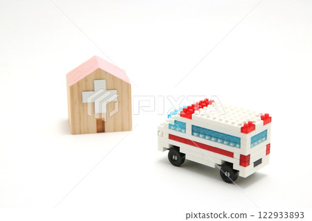 Miniature model of ambulance and hospital | Image of medical care, emergency care, and hospital 122933893