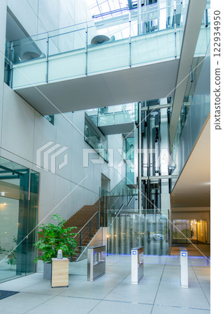 Office building entrance with security gate Office building entrance with security gate 122934950