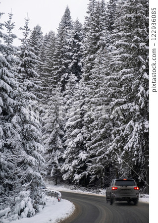 Car on Snowy Mountain Road Car on Snowy Mountain Road 122936085