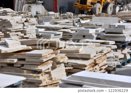 Stacked limestone slabs and tiles Stacked limestone slabs and tiles 122936229