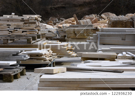 Stacked limestone slabs and tiles Stacked limestone slabs and tiles 122936230