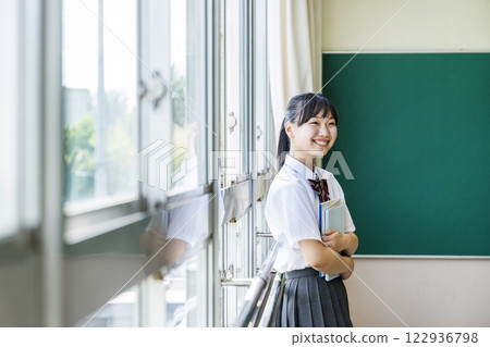 High school girl portrait smiling profile High school girl portrait smiling profile 122936798
