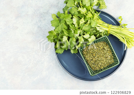 Fresh and dry coriander cilantro. Fresh and dry coriander cilantro. 122936829