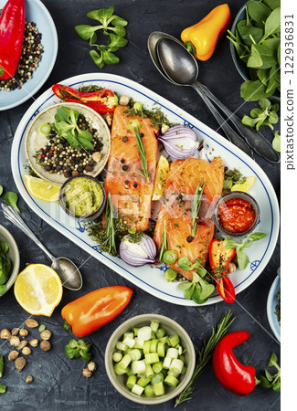 Raw salmon fish and ingredients for cooking and seasoning 122936831