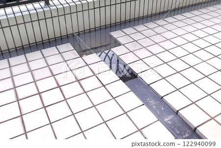 Balcony drain clogged with garbage, like a swimming pool, dangerous 122940099