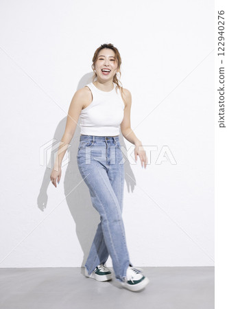 Cute woman dancing Cute woman dancing 122940276