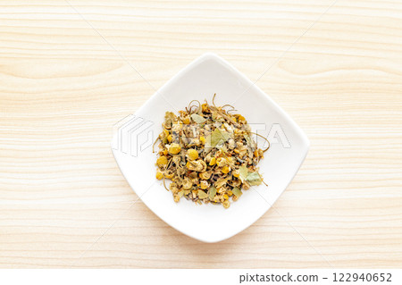 Drink herbal tea (chamomile, lavender, etc.) for relaxation and to combat insomnia Drink herbal tea (chamomile, lavender, etc.) for relaxation and to combat insomnia 122940652