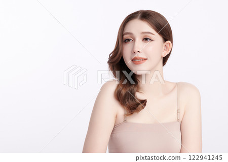 Beautiful young asian woman with clean fresh skin on white background, Face care, Facial treatment, Cosmetology, beauty and spa, Asian women portrait. Beautiful young asian woman with clean fresh skin on white background, Face care, Facial treatment, Cosmetology, beauty and spa, Asian women portrait. 122941245