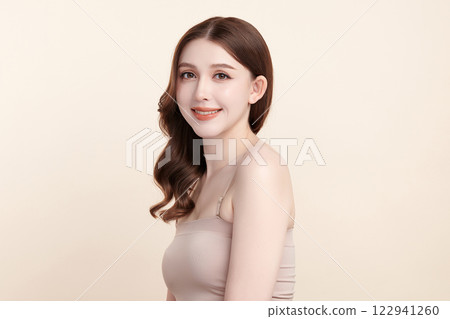 Beautiful young asian woman with clean fresh skin on beige background, Face care, Facial treatment, Cosmetology, beauty and spa, Asian women portrait. 122941260