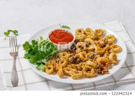 deep fried battered baby squid rings and tentacles 122942324