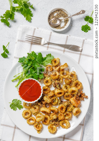 deep fried battered baby squid rings and tentacles 122942330