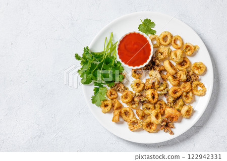 deep fried battered baby squid rings and tentacles 122942331