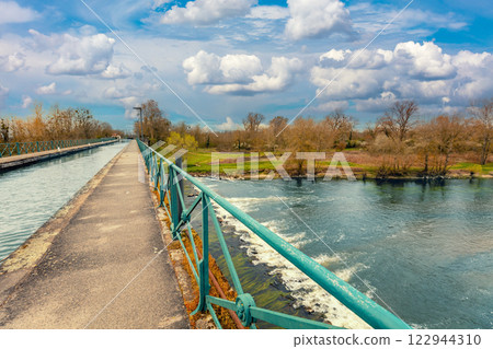 Digoin canal bridge. Boat canal bridge over Laura river in early spring. Digoin, France 122944310