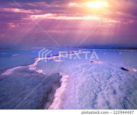 The texture of the Dead Sea. Seascape, unique sea. Salty seashore. Israel 122944487