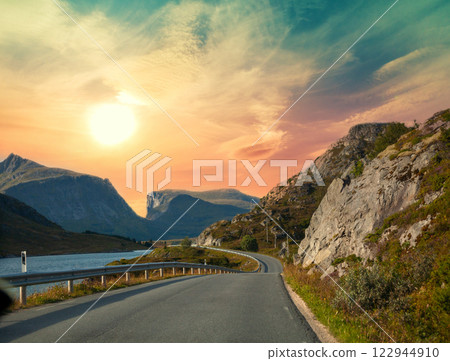 The road along the fjord during sunset. The road to the North Cape, Norway 122944910