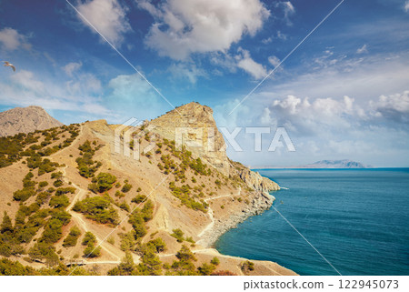 Rocky sea coast. Wilde beach. Rocky bay 122945073