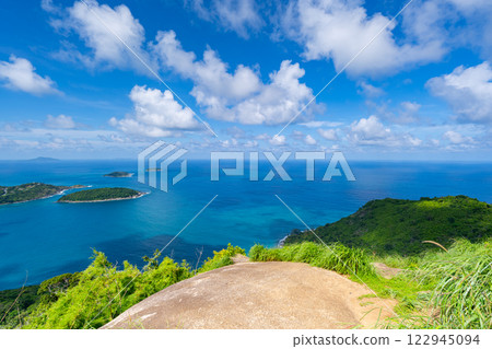Beautiful blue sky white clouds over sea ocean background 122945094