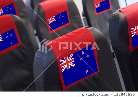 New Zealand Flag on Empty seat in plane. Travel, flight and transportration concept 122945689