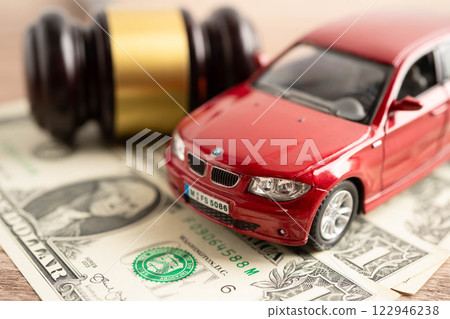Bangkok, Thailand November 18, 2023 Car on banknote money, buying or insurance concept. 122946238
