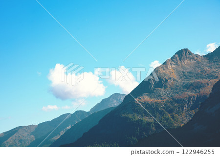 Beautiful mountains against the background of the day blue sky 122946255