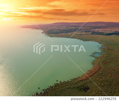View from above of Tihany peninsula and Balaton lake during sunset 122946259