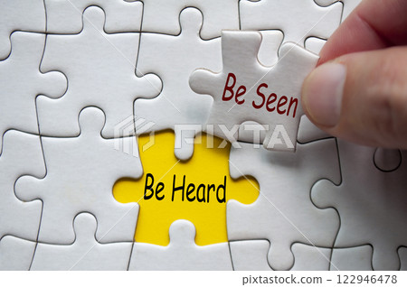 Be seen and Be Heard text on jigsaw puzzle. Marketing and business concept 122946478