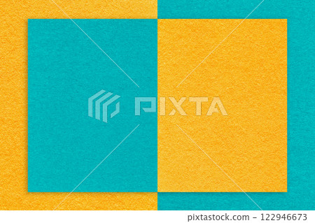 Texture yellow and turquoise paper background with geometric shape, macro. Structure craft cerulean cardboard Texture yellow and turquoise paper background with geometric shape, macro. Structure craft cerulean cardboard 122946673