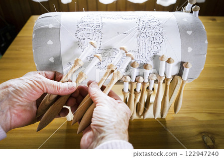 Bobbin lace Bobbin lace 122947240