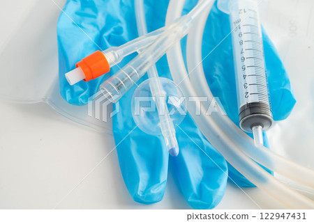 Foley catheter and urine drainage bag collect urine for disability or patient in hospital. 122947431