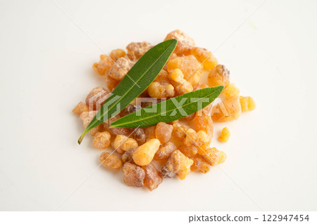 Frankincense or olibanum aromatic resin isolated on white background used in incense and perfumes. 122947454