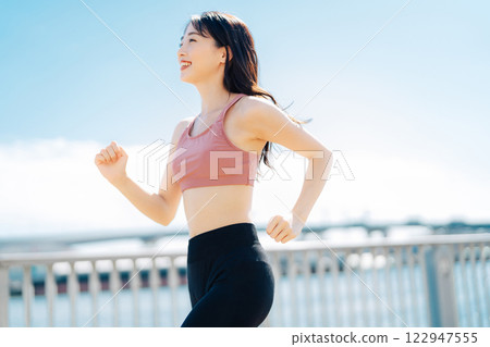 A young lad who jogs 122947555