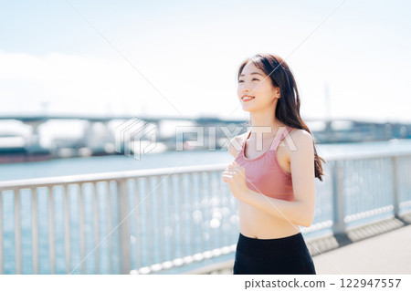 A young lad who jogs 122947557