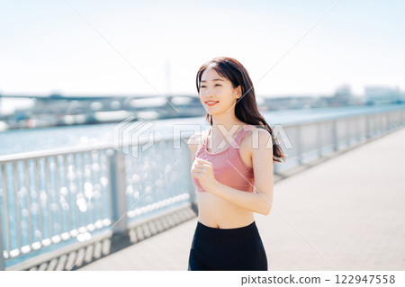 A young lad who jogs 122947558