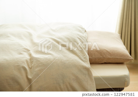 Bedroom futon, bed, mattress and pillow 122947581