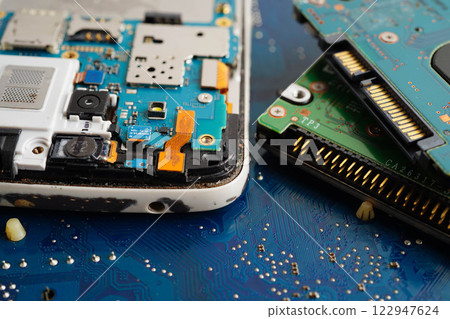 Repairing and upgrade mobile phone, electronic, computer hardware and technology concept. Repairing and upgrade mobile phone, electronic, computer hardware and technology concept. 122947624