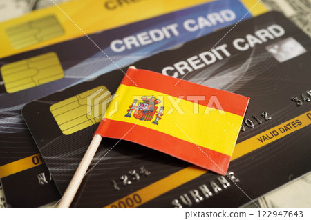 Spain flag on credit card, finance economy trading shopping online business. Spain flag on credit card, finance economy trading shopping online business. 122947643