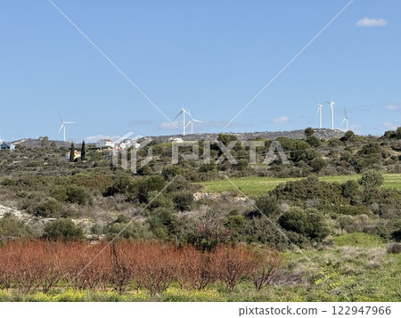 Wind turbines in a scenic landscape. Renewable energy sources, using wind to generate electricity. Wind turbines in a scenic landscape. Renewable energy sources, using wind to generate electricity. 122947966