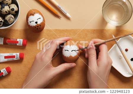 DIY and children's art. Step-by-step instructions: how to make cute owl Easter egg. Step 8: paint eyes in black paint from pencil sketch 122948123
