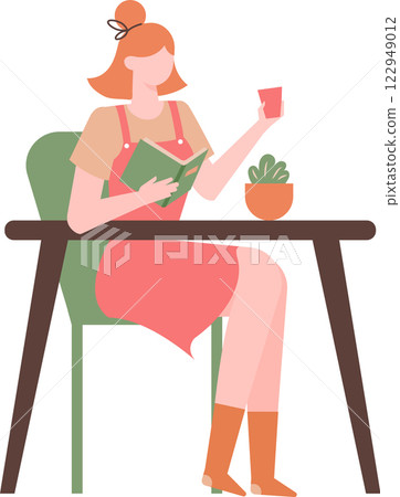Young woman enjoying reading a book while holding a cup, sitting comfortably at a table with a potted plant, depicting leisure and relaxation at home 122949012